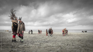 Malo Beach.Un air de peinture flamande. Carnavaleux sur la plage de Malo les Bains sous un ciel orageux.