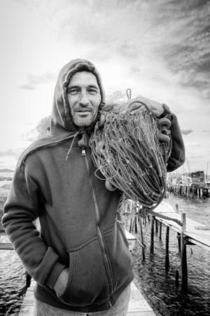 Alvaro, Un marin portugais pêchant entre mer et fleuve.